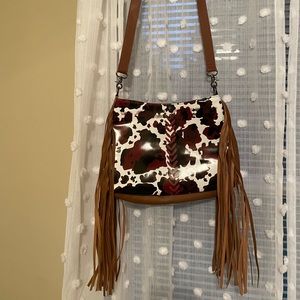 NWOT Cow print boho bag with tassels